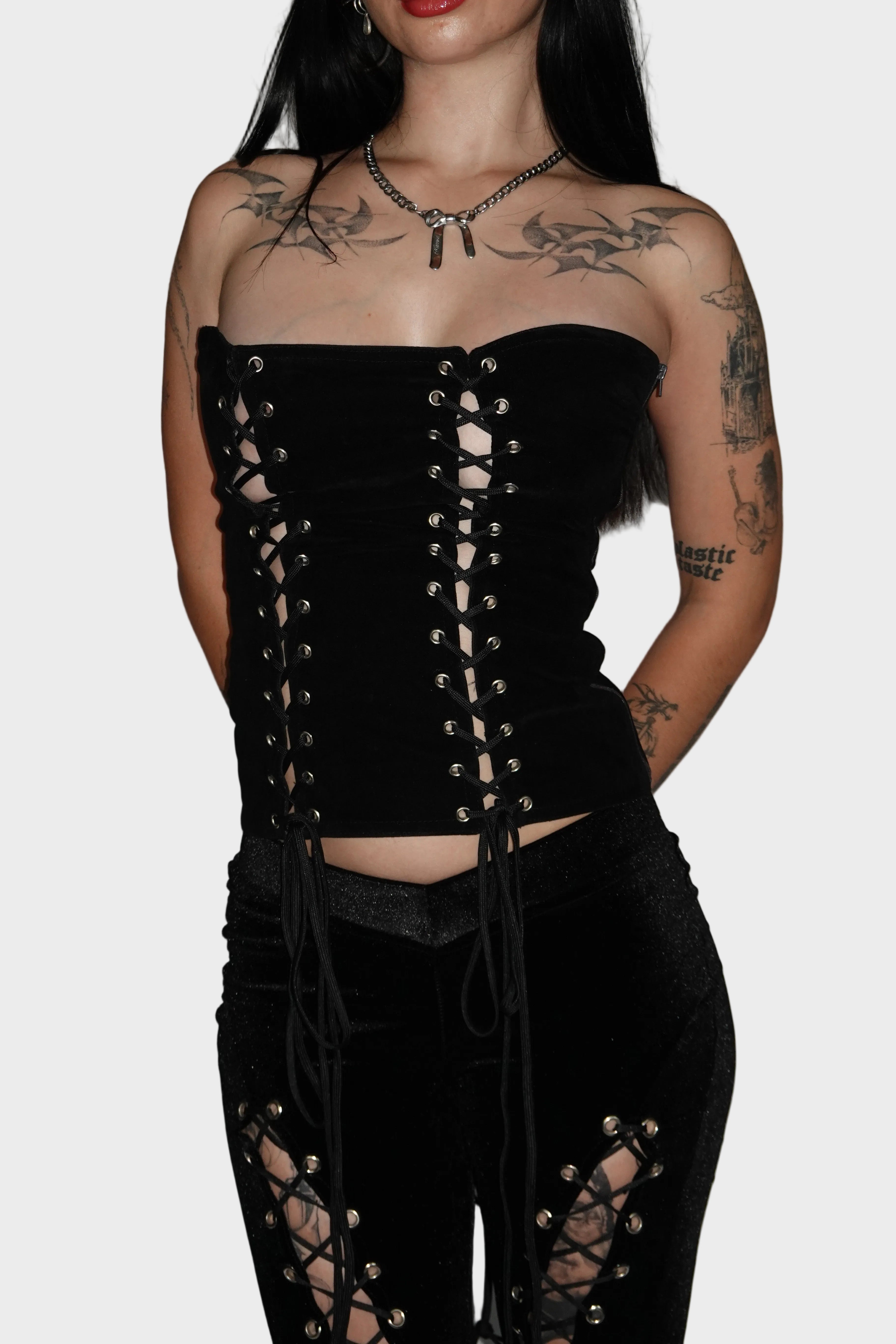 Front view of black cotton-poly velvet corset top with dual eyelet lace-up detail on model - Ravencross Top - FM2U Clothing Australia | Gothic Alternative Whimsical Ethical Fashion