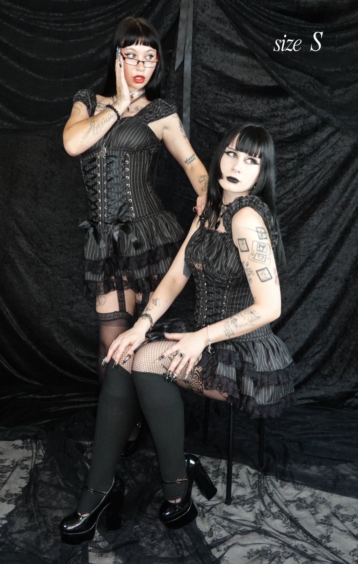 S model wearing black pinstripe steel-boned gothic corset mini dress with two tier ruffled lace skirt showing fit and silhouette - Sirena Mini Dress - FM2U Clothing Australia | Gothic Alternative Whimsical Ethical Fashion