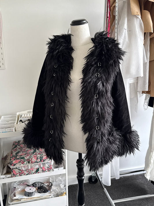 PIERCED AFGHAN COAT
